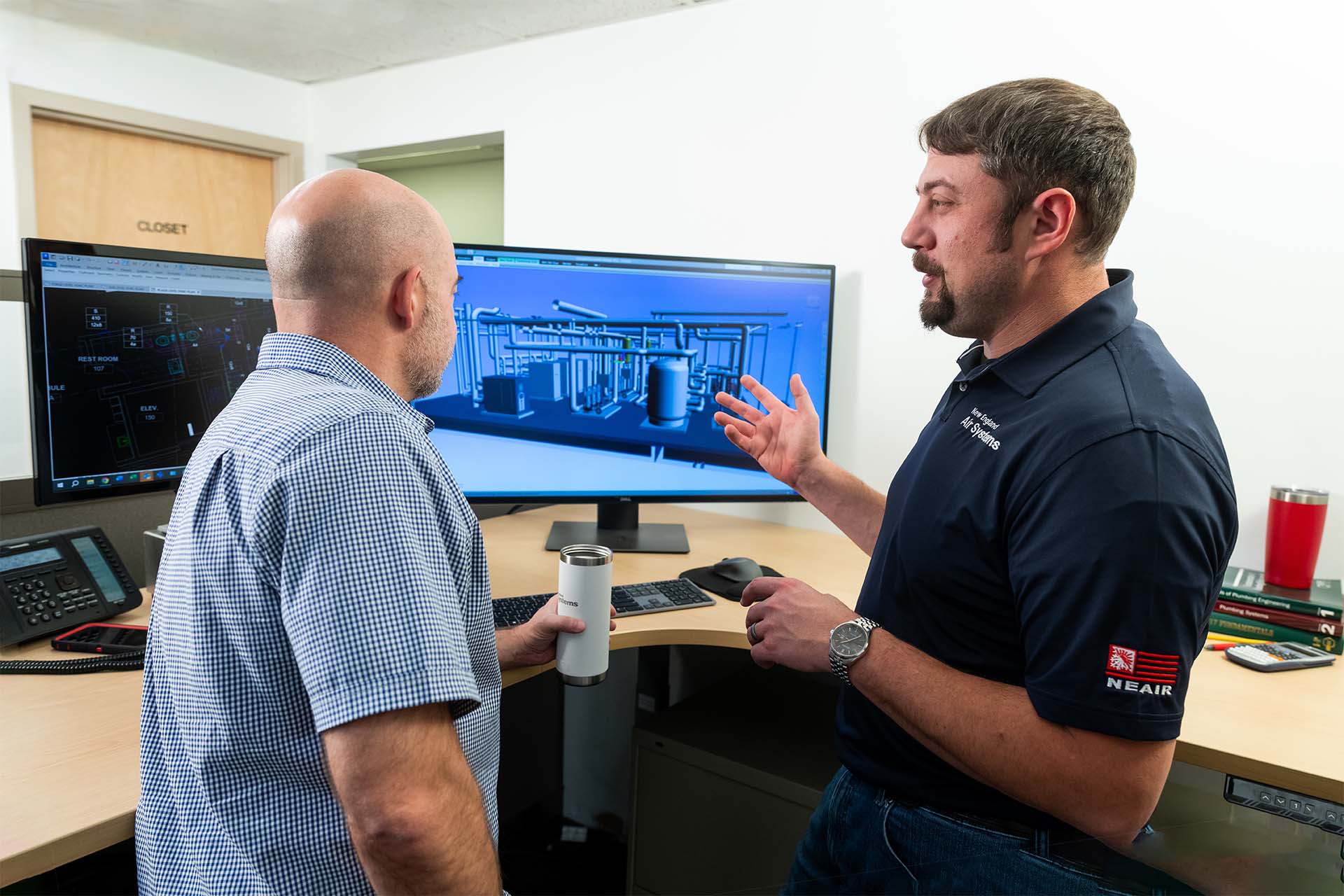 New England Air employees working on Revit software
